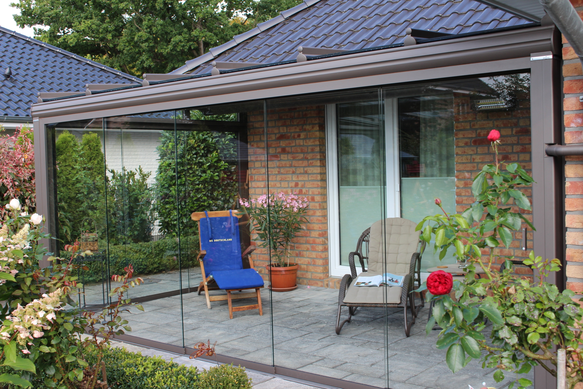 Kaltwintergarten mit Schiebetüren C & L Terrassendach
